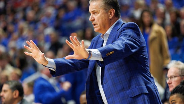 Dec 29, 2023; Lexington, Kentucky, USA; Kentucky Wildcats head coach John Calipari motions to his players during the first half against the Illinois State Redbirds at Rupp Arena at Central Bank Center. Mandatory Credit: Jordan Prather-USA TODAY Sports
